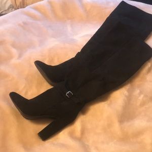 Wide calf high thigh suede high heels.